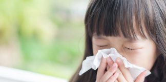 Bacterial and Fungal Infections in Babies & Children Girl sneezing
