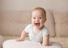 Cute & Lovely Baby Expressions and Their Meanings A smiling baby
