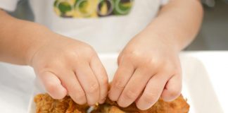15 Easy and Yummy Chicken Recipes For Kids A child having deep fried chicken