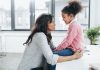 10 Common Parenting Issues and Their Solutions A mother talking to her daughter.