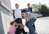 Child Bullying – Why does it Occur and How to Deal with it? A little girl being bullied by other kids