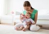 Baby Feeding- What to Feed & How Much to Feed A mother feeding her baby